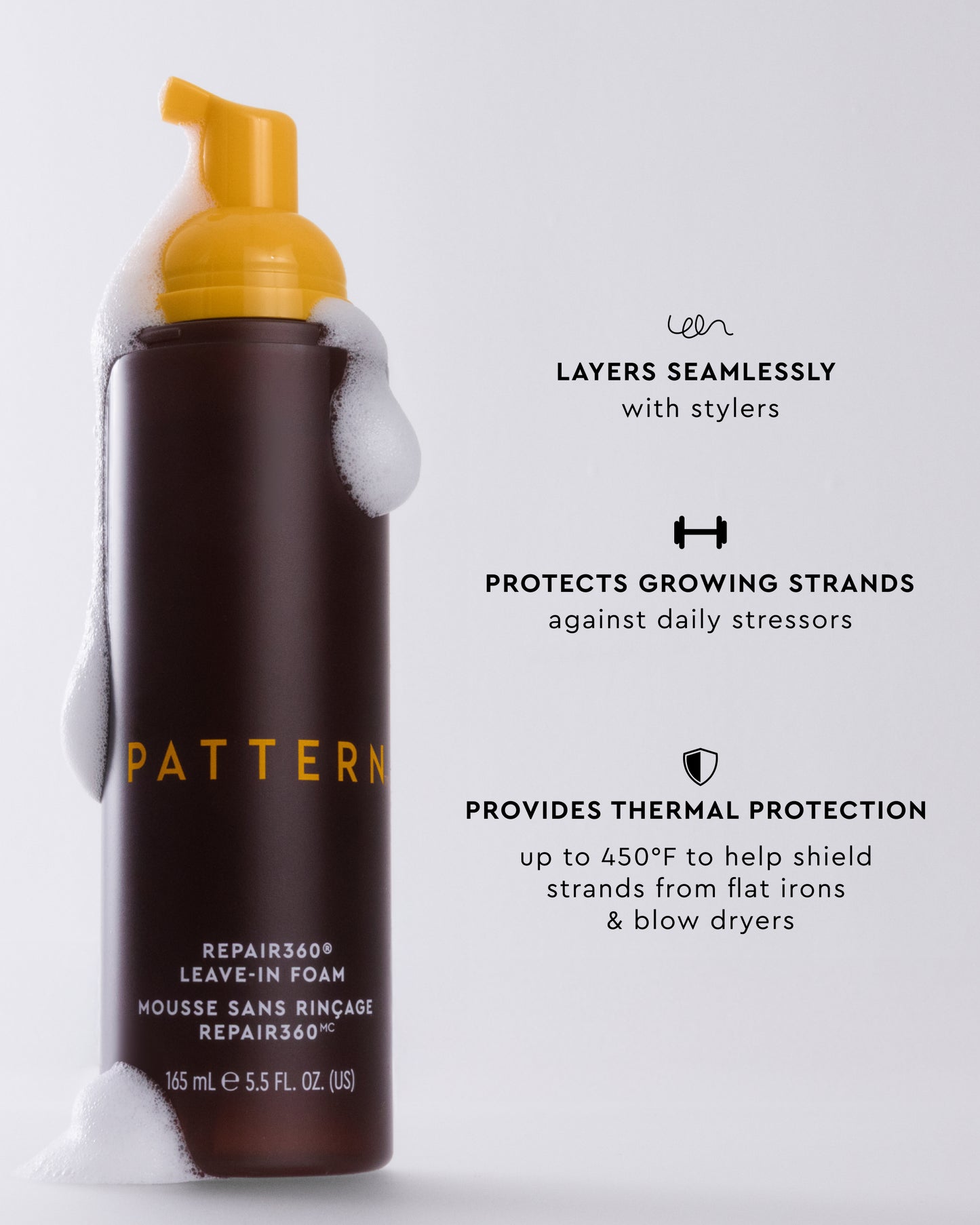 Repair360® Leave-in Foam - PATTERN Beauty Repair360® Leave-in Foam bottle with yellow pump and foam on dark brown packaging.