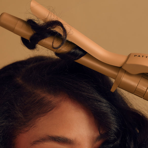 How To Enhance Your Natural Curls Using a Curling Iron