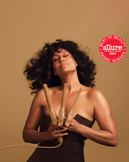 The Interchangeable Curling Iron - Golden interchangeable curling iron with a sleek handle from PATTERN Beauty by Tracee Ellis Ross.