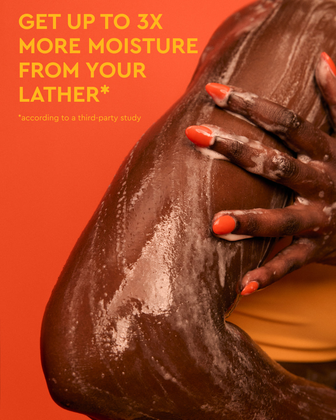 Daily Hydration Body Bundle - Moisturized dark skin with glossy hydrated shine and orange nail polish, PATTERN Beauty by Tracee Ellis Ross.