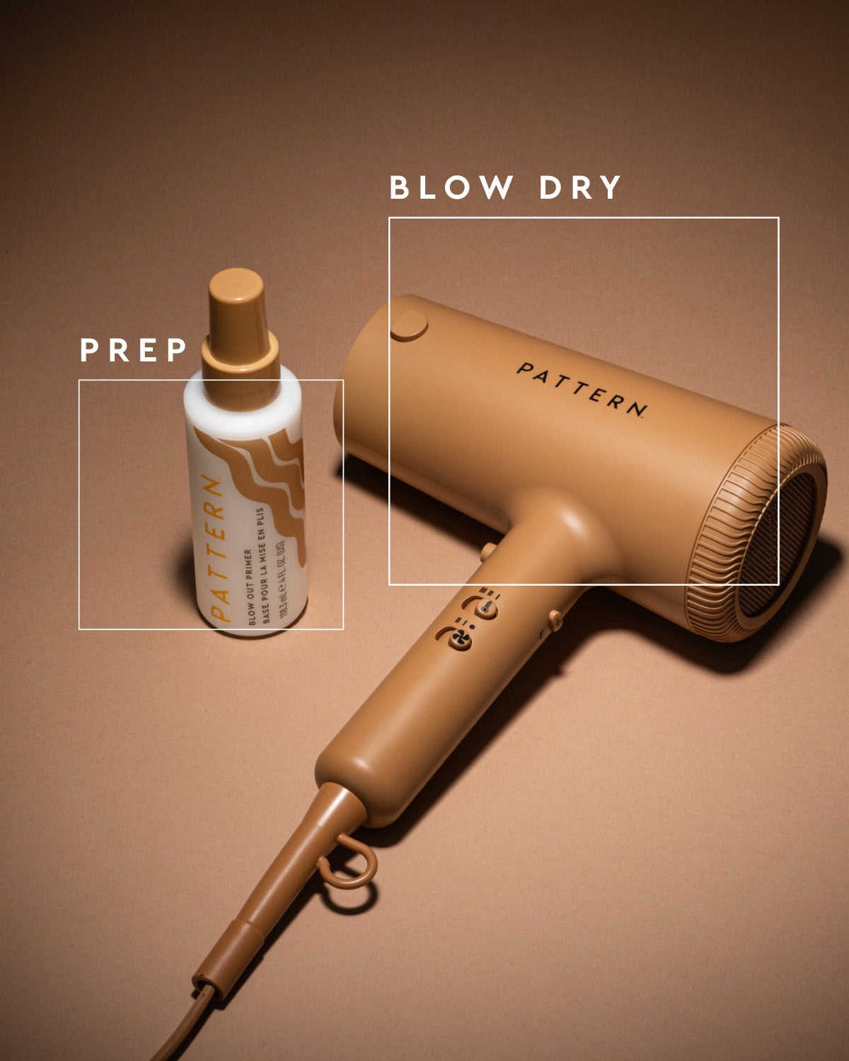A tan Pattern hair dryer with a matching tan nozzle lies on a warm brown background next to a white Pattern bottle labeled 'PREP'. White text boxes read 'PREP' and 'BLOW DRY' to indicate product steps.