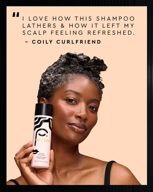 A woman with styled curly hair holds a bottle of Pattern Curly Curling Shampoo against a peach background, with a testimonial quote at the top.
