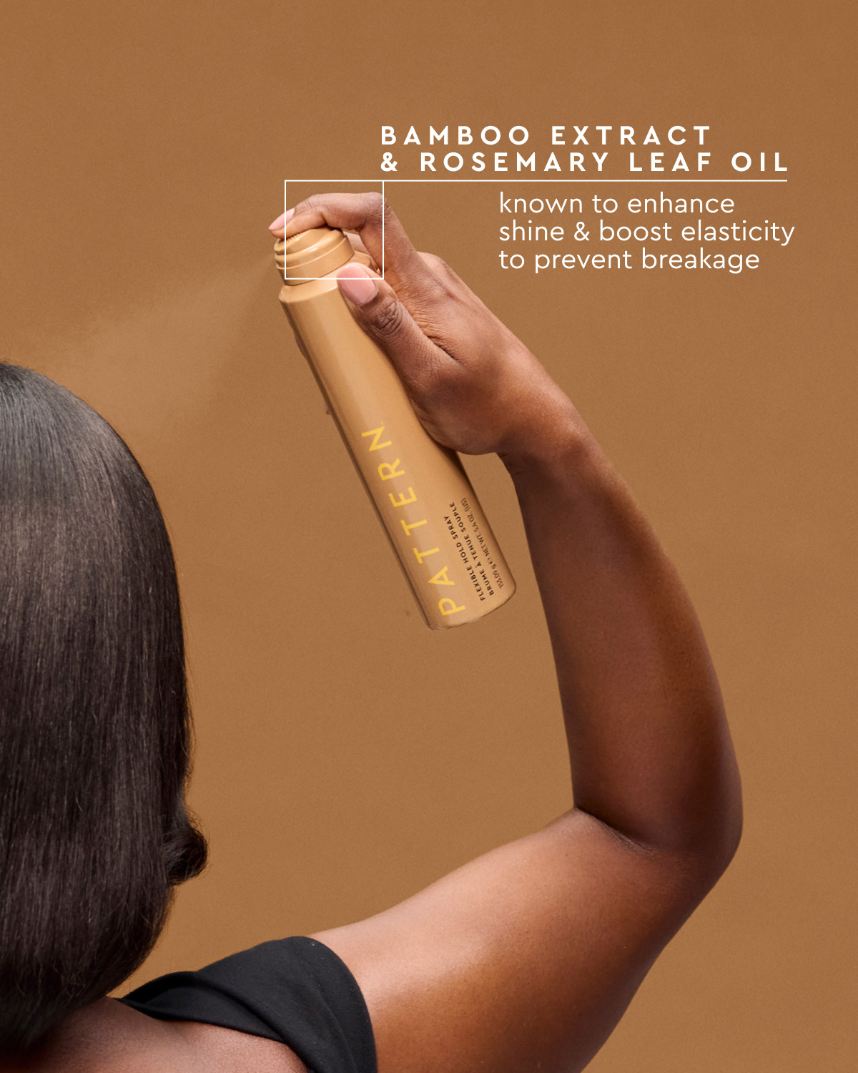 Flexible Hold Spray - PATTERN Beauty by Tracee Ellis Ross amber Flexible Hold Spray bottle held above glossy, straight hair.