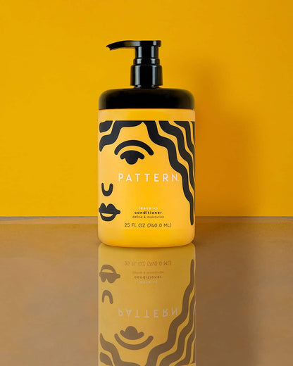 Leave-In Conditioner 25 FL OZ (740.0 ML)- Jumbo Yellow PATTERN Beauty by Tracee Ellis Ross leave-in conditioner bottle with a black pump and bold black label.
