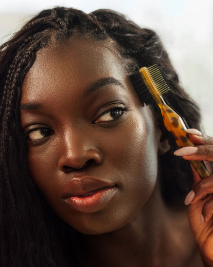 Tortoise Tool Kit with Pick - PATTERN Beauty by Tracee Ellis Ross tortoise hair tool kit with gold and tortoise pick comb held by woman with long braids.