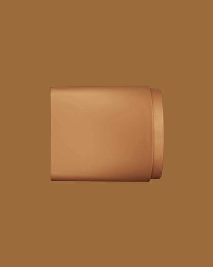 The PATTERN Blow Dryer - Matte bronze compact nozzle attachment for PATTERN Beauty blow dryer with smooth rounded edges.