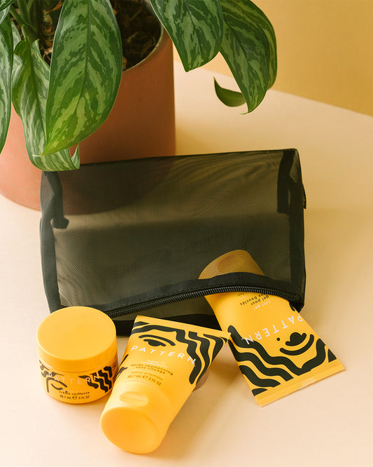 Curl Cocktail Kit - PATTERN Beauty by Tracee Ellis Ross Curl Cocktail Kit with yellow and black patterned hair care tubes and jar in black.