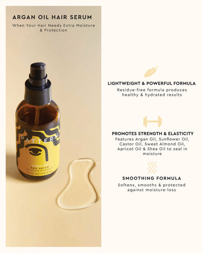 Argan Oil Blend - Amber glass bottle with black pump labeled PATTERN Beauty Argan Oil Hair Serum, next to clear gel applicator spoon on white.